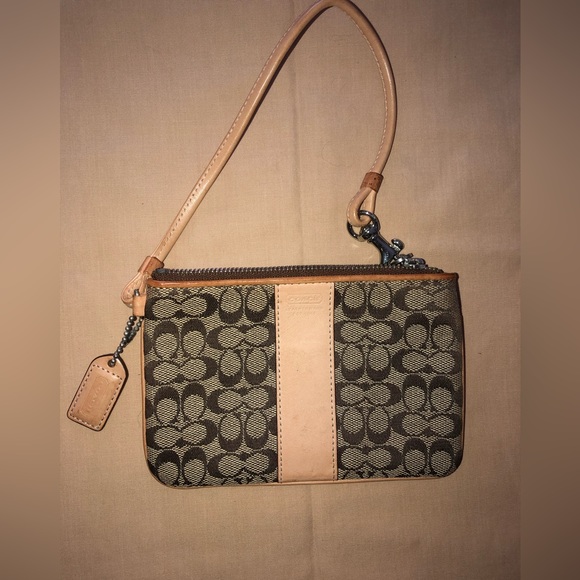 COACH Tan wristlet w Orange inside (Signature) - Picture 1 of 3